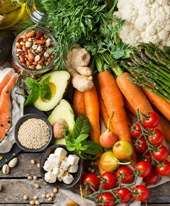 An assortment of healthy foods on a wooden table