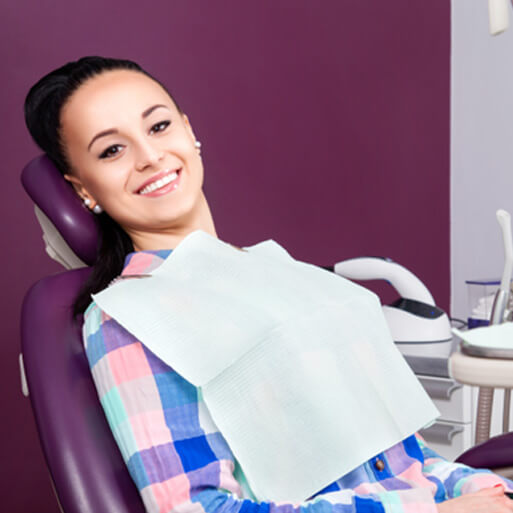 Woman smiling in the dental chair